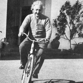 Albert Einstein on his bicycle